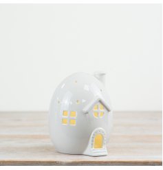 Elevate your seasonal range with this unique light up house. A fantastic Easter gift and seasonal accessory.