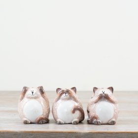 3 playful cat figurines featuring unique facial expressions. Perfect for cat lovers!