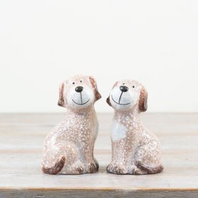 Transform any space with this set of two adorable dog figurines in calm brown and neutral hues for a woof-ifully coord