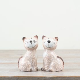 Pair of adorable pottery cats featuring warm brown hues and friendly expressions. Perfect for any cat lover.