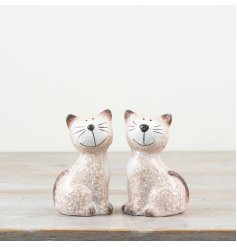 Add a touch of charm with 2 handmade pottery cats in neutral tones & happy faces. Perfect for any home!