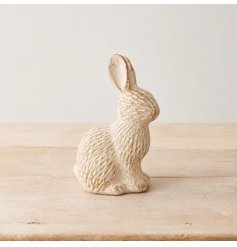Enhance your spring decor with this delightful cement bunny.