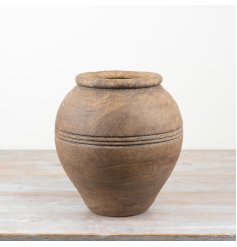 a rustic large urn shaped planter 