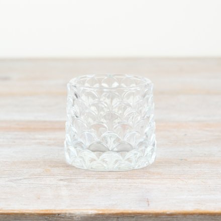 Illuminate your space with a touch of elegance with our Patterned Glass Candle Holder
