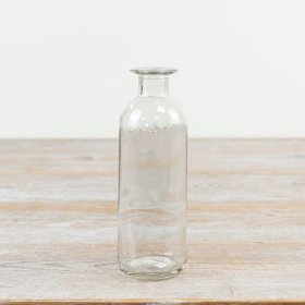 Elegant bud vase made of clear glass for a touch of sophistication to any space.