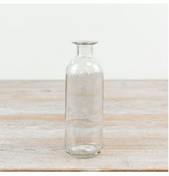 A stylish clear bottle bud vase 