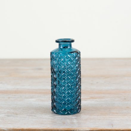 Elegant blue vase with a beautiful patterned design.