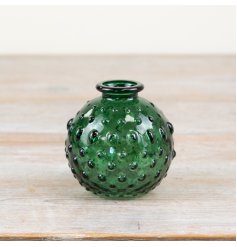Add elegance to your decor with this chic green vase embellished with a unique bobble pattern.