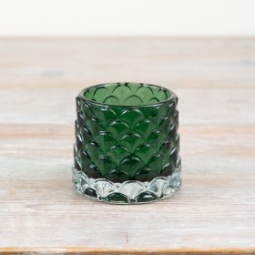 Enhance your space with elegance using our Green Glass Candle Holder - a charming addition to any decor.
