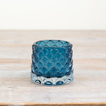Bring beach vibes to any space with our elegantly crafted coastal candle holder. 