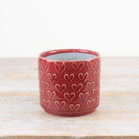 Chic red heart-shaped mini planter for a charming touch to your space.