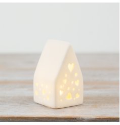 Illuminate your space with this charming White Porcelain LED House