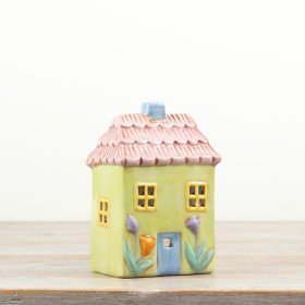 This charming tea light holder features a beautiful blend of pastel colors for a stylish touch.