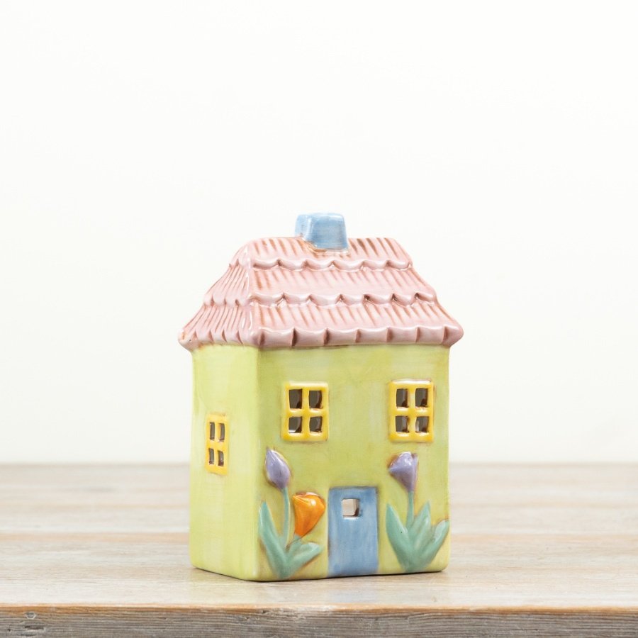 This charming tea light holder features a beautiful blend of pastel colors for a stylish touch.