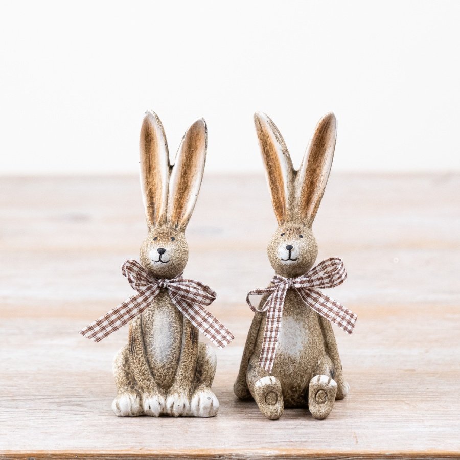 Charming mix of 2 rustic sitting rabbit figurines.