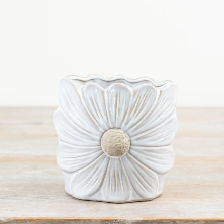Bring the outdoors in with this daisy shaped porcelain vase. Complete with a raw and glossy finish. 