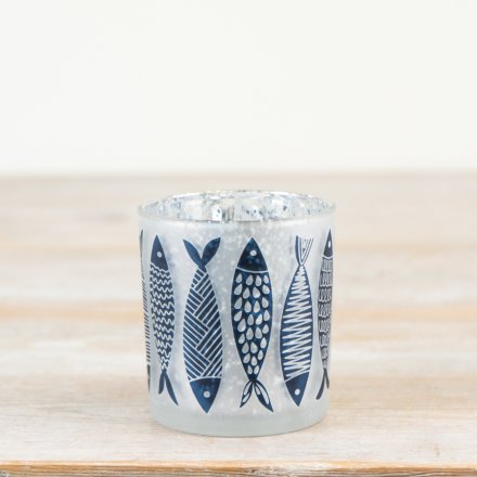 Add coastal charm with this elegant glass tealight holder,