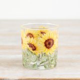 Add a warm, floral glow to your space with this charming Yellow and Green Glass Sunflower Candle Holder