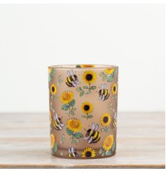 Adorable candle holder featuring a delightful bee motif.