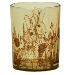 Add a whimsical touch to your space with this elegant glass candle holder featuring a charming rabbit pattern. 