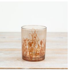 Tall candle holder featuring a rabbit and floral design.