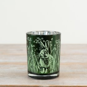 Delightful candle holder featuring a cute rabbit design.