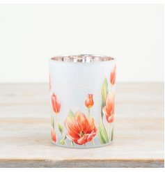 Elegantly designed glass candle holder with delicate flower pattern