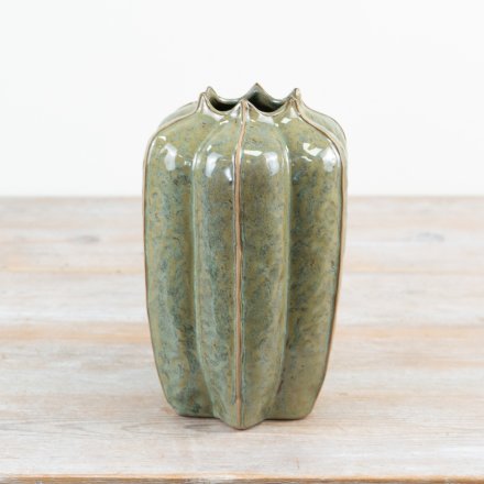 Bring the joy of nature into the home with this richly glazed green seeded vessel vase.