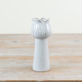 Vase featuring a floral design in natural tones