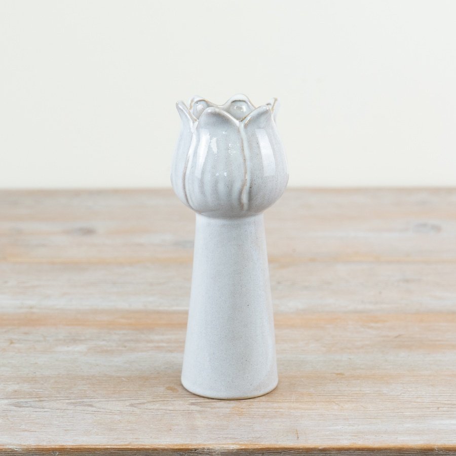 Vase featuring a floral design in natural tones