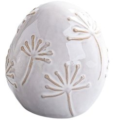 Charming porcelain egg ornament,