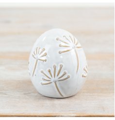 Delightful porcelain egg decoration, perfect for adding elegance to any setting.
