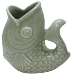 Elevate your space with this on trend fish vase in a sage green colour tone. 