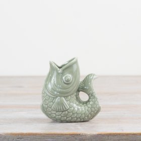 Enhance your décor with this stylish sage green fish vase, perfect for adding a trendy touch to any space.
