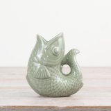 Add a playful touch to the home with this stylish fish vase in a sage green colour tone.