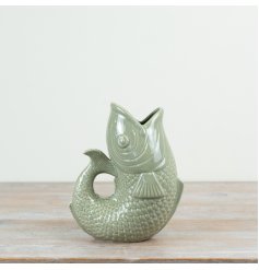 Brighten up any space with this beautiful Sage Green Fish Vase, adding a touch of charm to your decor.