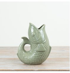 Brighten up any space with this beautiful Sage Green Fish Vase, adding a touch of charm to your decor.