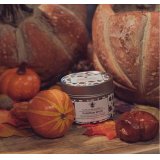 a unique pumpkin design tin candle