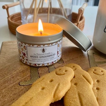 Fill your home with the warm, sweet aroma of baked gingerbread with this charming festive candle.