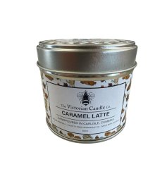 Bring a warm, inviting aroma to your space with this beautifully scented candle in a sleek metal tin.