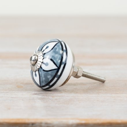 Retro door knob with a sleek, modern silver finish for a timeless look.