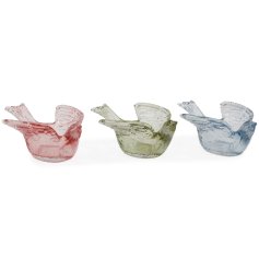 Add a touch of nature-inspired elegance to your home with these bird candle holders.