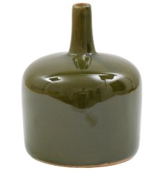 Enhance your space with the charm of this elegant green bottle vase.