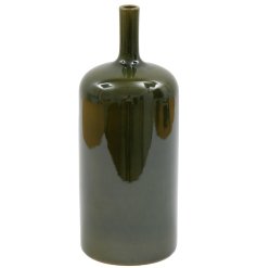 Bring natural charm to your space with this 12x32cm green bottle vase.