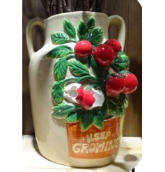 Add a vibrant splash of color to your home with this tomato vase 