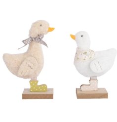  a charming wooly duck on a wooden base 