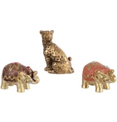 An assortment of 3 gold figurines in beautiful animal designs