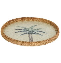Add natural elegance to your space with the Tray Rattan Round Milk Glue Palm Pattern