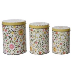Keep your kitchen cheerful and tidy with this charming set of three vibrant tulip-patterned storage tins