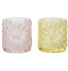 Enhance your space with this clear glass tealight holder for a touch of elegance.